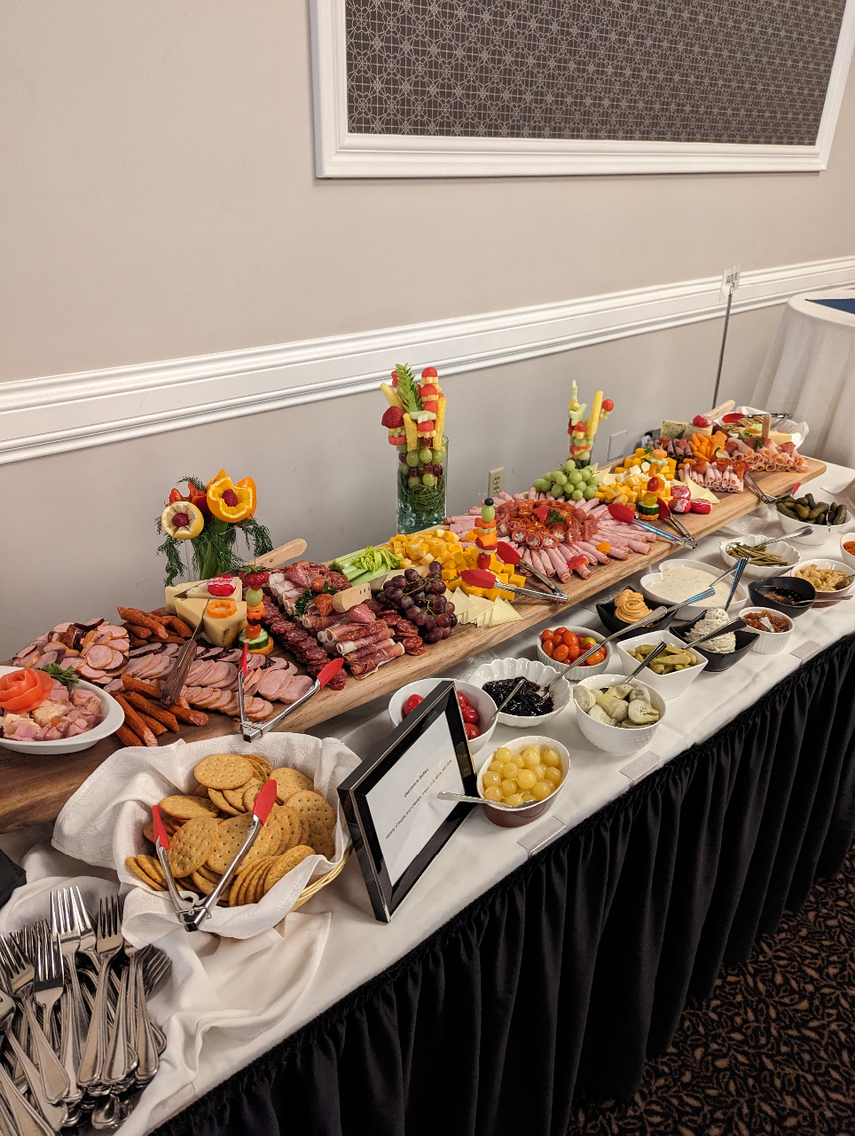 This photo features a table of some of the assorted food items for guests at the event.